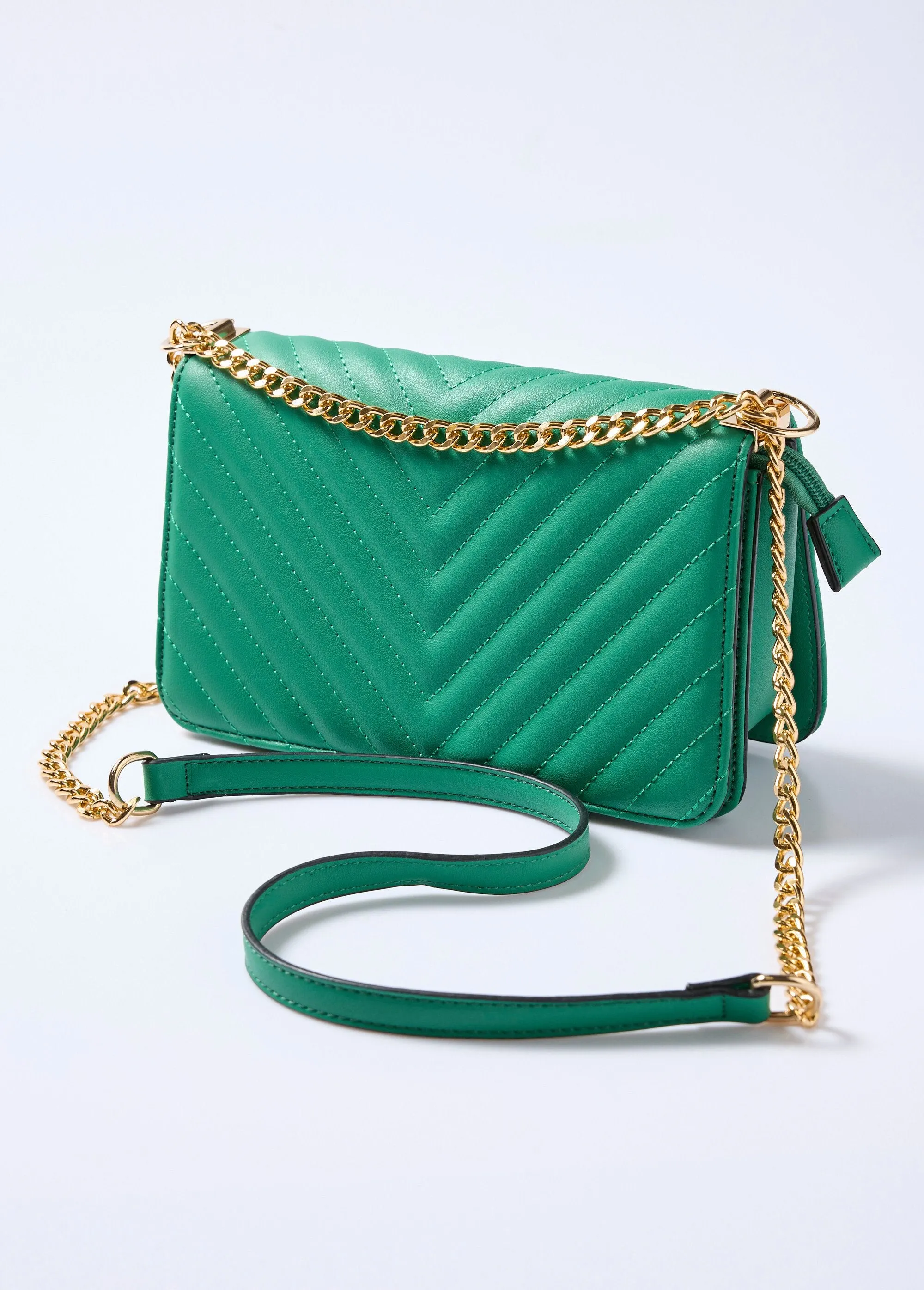 Quilted clutch bag with chevron stitching