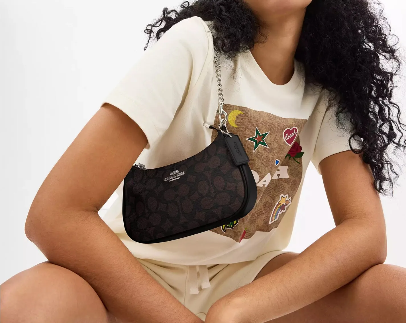 Teri Mini Crossbody Bag In Signature Canvas Walnut Black Coach