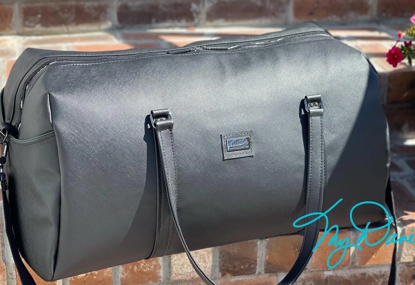 The Coalition Duffle Bag in Black Modern with Camo