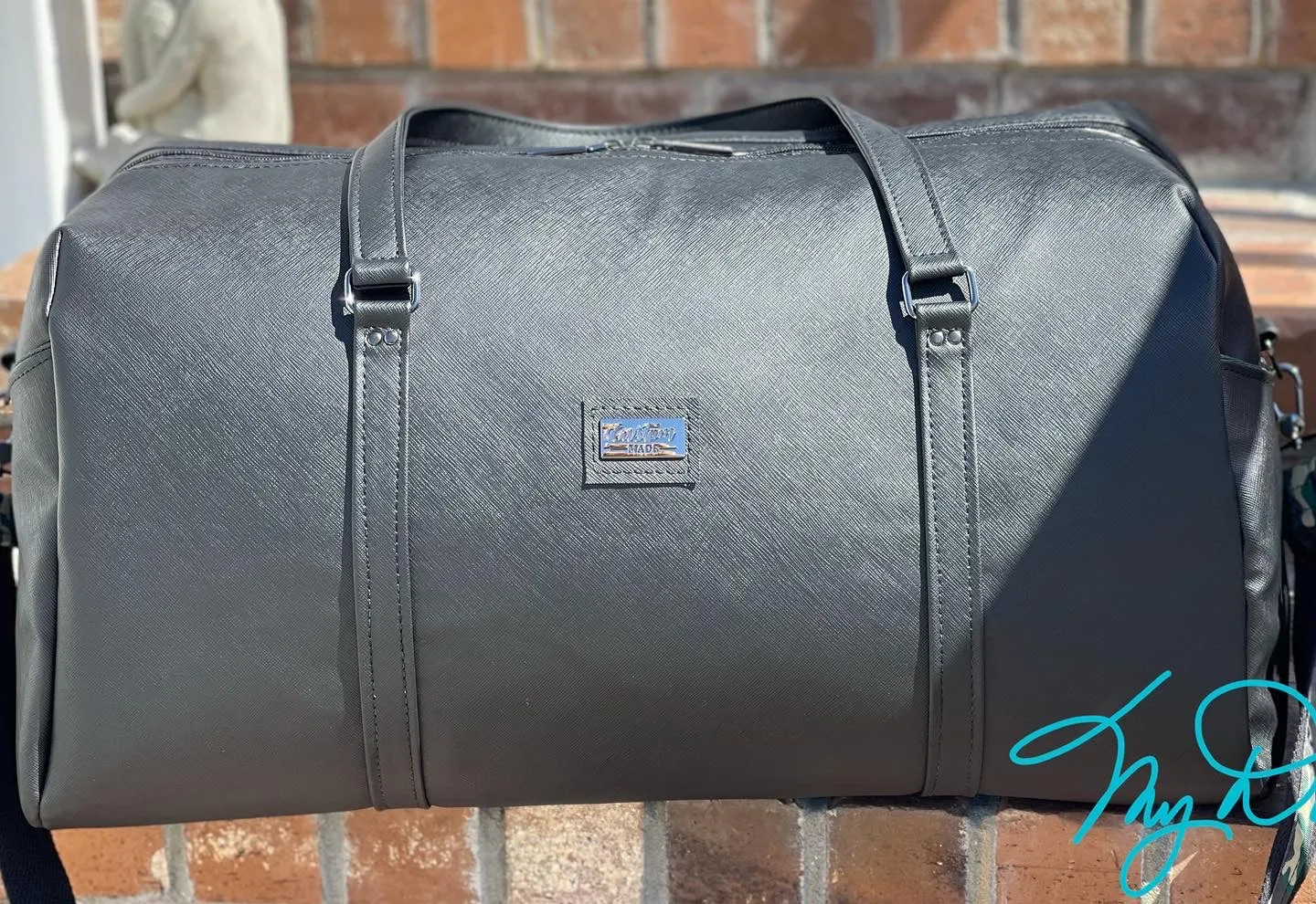 The Coalition Duffle Bag in Black Modern with Camo