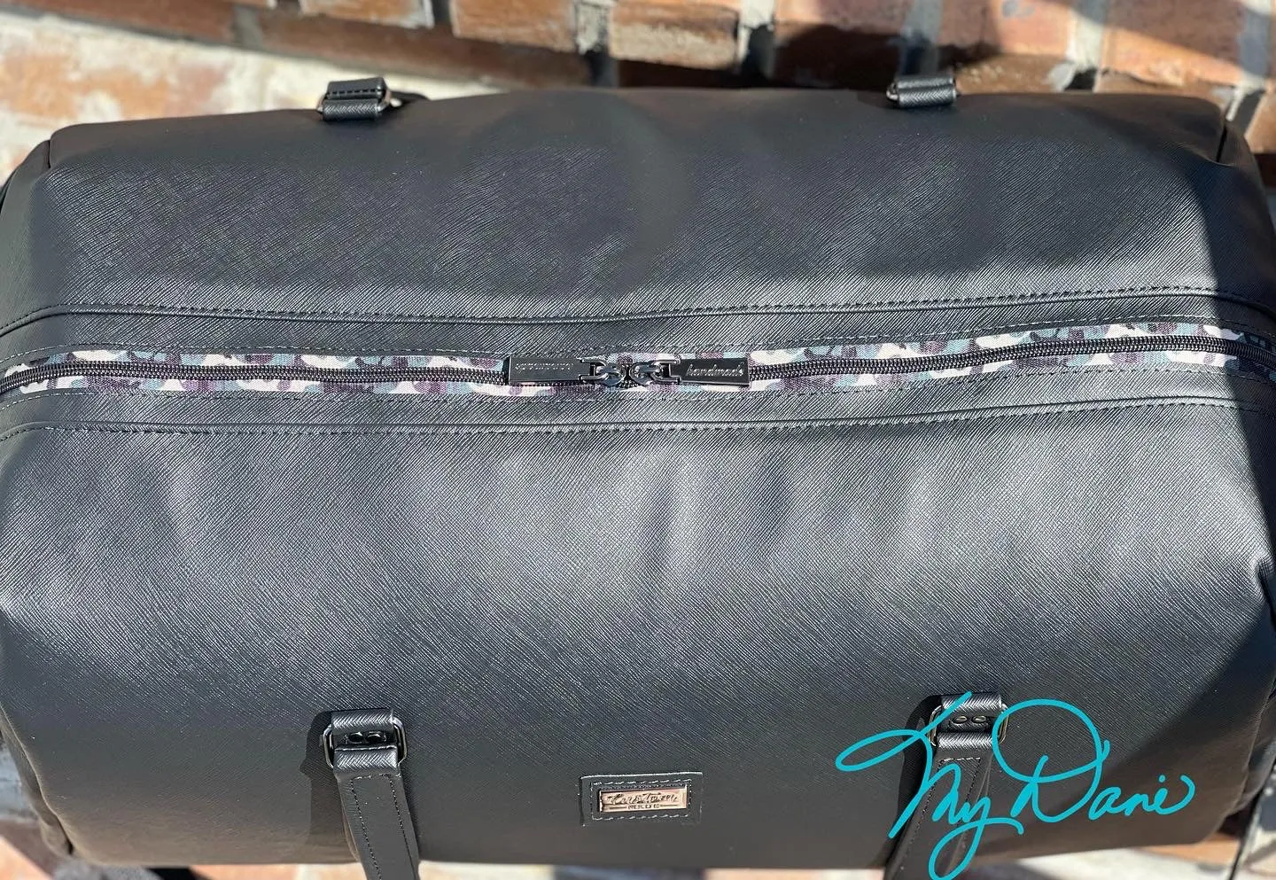 The Coalition Duffle Bag in Black Modern with Camo